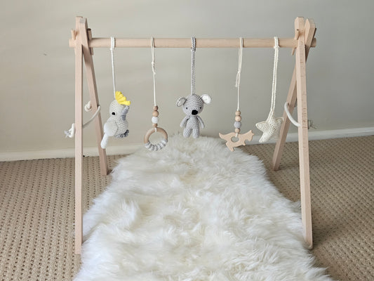 Aussie themed play gym with wooden frame, Crochet Star, crochet grey Koala, crochet Cockatoo and 2 wooden hanging toys