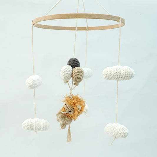 Crocheted Lion hanging mobile with cream clouds and cream, beige and dark grey crocheted balloons